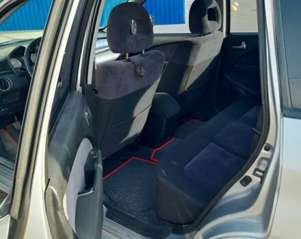 Серый Мицубиси Аутлендер, объемом двигателя 2 л и пробегом 320 тыс. км за 7300 $, фото 8 на Automoto.ua