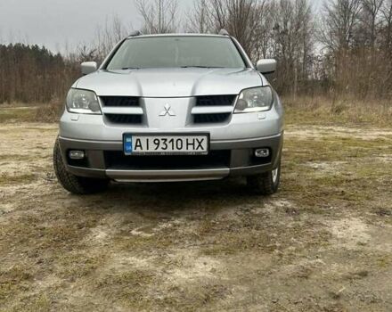 Серый Мицубиси Аутлендер, объемом двигателя 2.4 л и пробегом 265 тыс. км за 6400 $, фото 3 на Automoto.ua