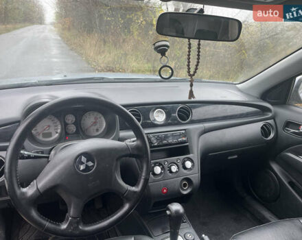 Серый Мицубиси Аутлендер, объемом двигателя 2.38 л и пробегом 432 тыс. км за 4700 $, фото 5 на Automoto.ua