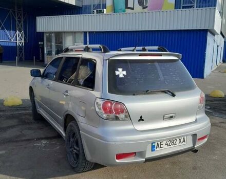 Серый Мицубиси Аутлендер, объемом двигателя 2 л и пробегом 320 тыс. км за 7300 $, фото 6 на Automoto.ua
