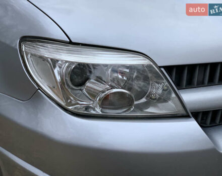 Серый Мицубиси Аутлендер, объемом двигателя 2 л и пробегом 239 тыс. км за 5800 $, фото 10 на Automoto.ua