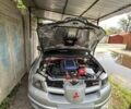 Сірий Міцубісі Аутлендер, об'ємом двигуна 2 л та пробігом 227 тис. км за 8500 $, фото 2 на Automoto.ua