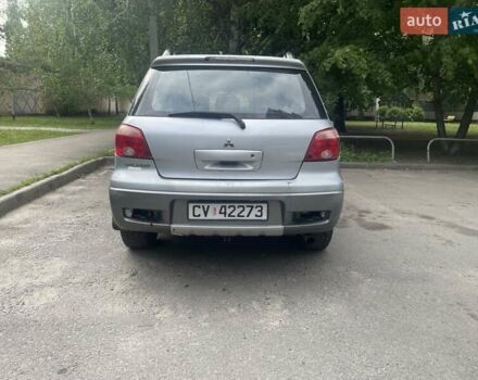 Серый Мицубиси Аутлендер, объемом двигателя 0 л и пробегом 275 тыс. км за 3000 $, фото 5 на Automoto.ua