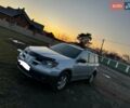 Серый Мицубиси Аутлендер, объемом двигателя 2.35 л и пробегом 277 тыс. км за 5000 $, фото 1 на Automoto.ua
