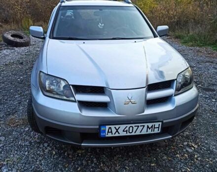 Серый Мицубиси Аутлендер, объемом двигателя 2.4 л и пробегом 317 тыс. км за 5200 $, фото 4 на Automoto.ua