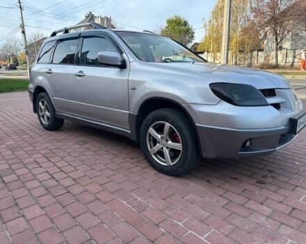 Серый Мицубиси Аутлендер, объемом двигателя 2.4 л и пробегом 221 тыс. км за 5550 $, фото 3 на Automoto.ua