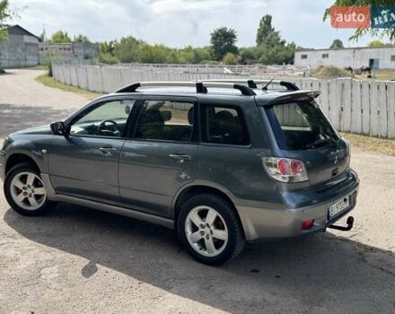 Серый Мицубиси Аутлендер, объемом двигателя 2.4 л и пробегом 276 тыс. км за 6299 $, фото 3 на Automoto.ua