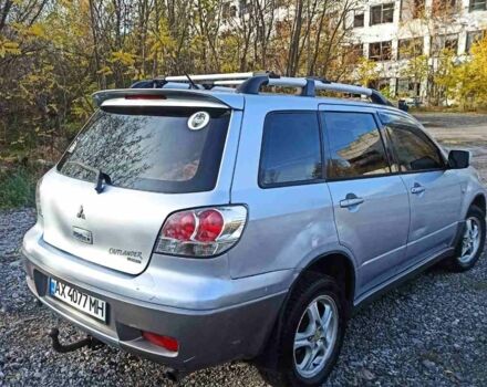 Серый Мицубиси Аутлендер, объемом двигателя 2.4 л и пробегом 317 тыс. км за 5200 $, фото 2 на Automoto.ua