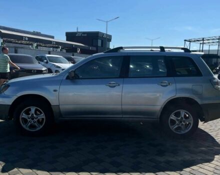 Серый Мицубиси Аутлендер, объемом двигателя 2.4 л и пробегом 240 тыс. км за 5700 $, фото 3 на Automoto.ua