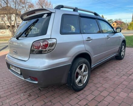 Серый Мицубиси Аутлендер, объемом двигателя 2.4 л и пробегом 221 тыс. км за 5550 $, фото 5 на Automoto.ua