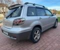 Серый Мицубиси Аутлендер, объемом двигателя 2.4 л и пробегом 221 тыс. км за 5550 $, фото 5 на Automoto.ua
