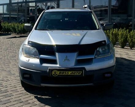 Серый Мицубиси Аутлендер, объемом двигателя 2.4 л и пробегом 240 тыс. км за 5700 $, фото 1 на Automoto.ua