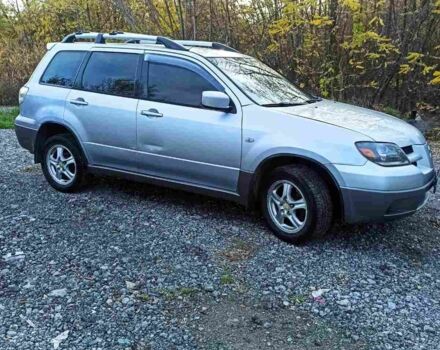Серый Мицубиси Аутлендер, объемом двигателя 2.4 л и пробегом 317 тыс. км за 5200 $, фото 5 на Automoto.ua