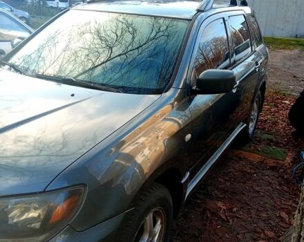 Серый Мицубиси Аутлендер, объемом двигателя 2.4 л и пробегом 204 тыс. км за 5600 $, фото 3 на Automoto.ua