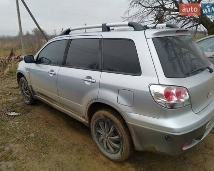 Серый Мицубиси Аутлендер, объемом двигателя 2.38 л и пробегом 255 тыс. км за 6000 $, фото 7 на Automoto.ua