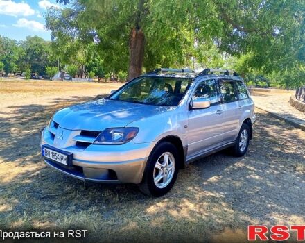 Серый Мицубиси Аутлендер, объемом двигателя 2.4 л и пробегом 270 тыс. км за 4999 $, фото 2 на Automoto.ua