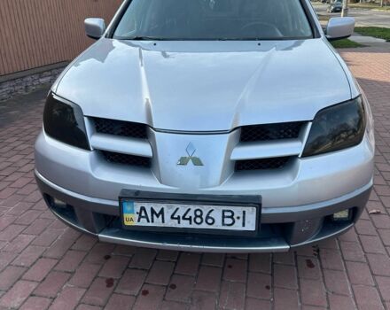 Серый Мицубиси Аутлендер, объемом двигателя 2.4 л и пробегом 221 тыс. км за 5550 $, фото 1 на Automoto.ua