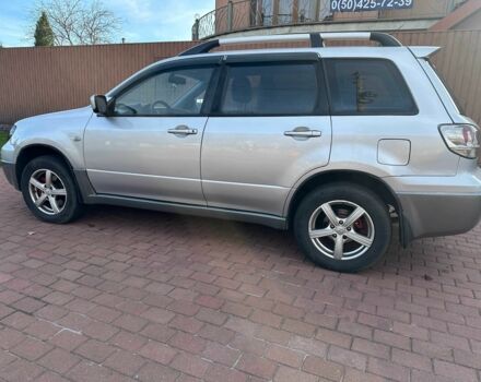 Серый Мицубиси Аутлендер, объемом двигателя 2.4 л и пробегом 221 тыс. км за 5550 $, фото 8 на Automoto.ua