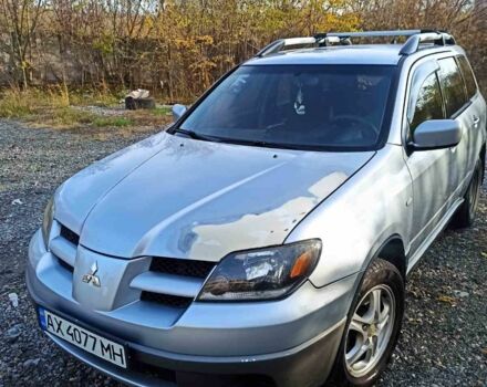 Серый Мицубиси Аутлендер, объемом двигателя 2.4 л и пробегом 317 тыс. км за 5200 $, фото 1 на Automoto.ua