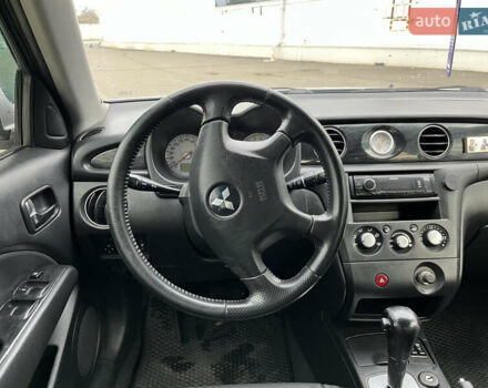 Сірий Міцубісі Аутлендер, об'ємом двигуна 2.38 л та пробігом 252 тис. км за 5400 $, фото 7 на Automoto.ua