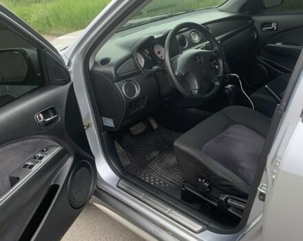 Серый Мицубиси Аутлендер, объемом двигателя 2.4 л и пробегом 229 тыс. км за 4850 $, фото 7 на Automoto.ua