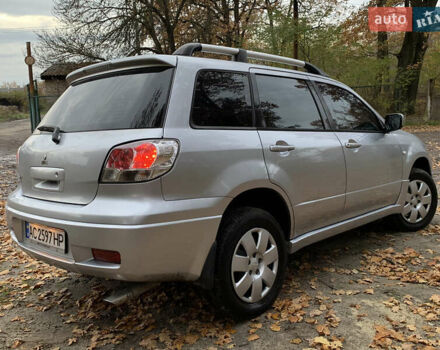 Серый Мицубиси Аутлендер, объемом двигателя 2 л и пробегом 239 тыс. км за 5800 $, фото 5 на Automoto.ua