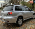 Серый Мицубиси Аутлендер, объемом двигателя 2 л и пробегом 239 тыс. км за 5800 $, фото 5 на Automoto.ua