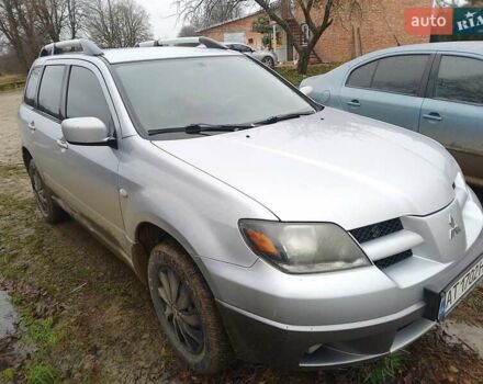 Серый Мицубиси Аутлендер, объемом двигателя 2.38 л и пробегом 255 тыс. км за 6000 $, фото 6 на Automoto.ua
