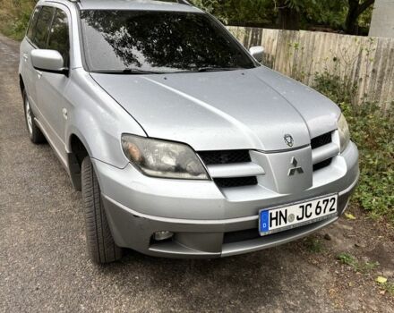 Серый Мицубиси Аутлендер, объемом двигателя 2 л и пробегом 2 тыс. км за 4261 $, фото 1 на Automoto.ua