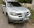 Серый Мицубиси Аутлендер, объемом двигателя 2 л и пробегом 2 тыс. км за 4261 $, фото 1 на Automoto.ua
