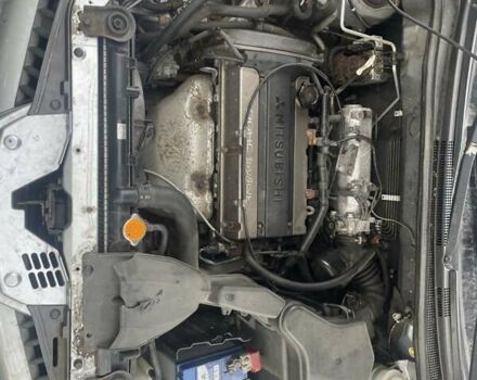 Серый Мицубиси Аутлендер, объемом двигателя 0 л и пробегом 275 тыс. км за 3000 $, фото 4 на Automoto.ua