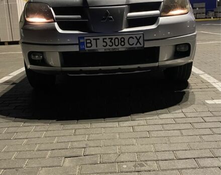 Серый Мицубиси Аутлендер, объемом двигателя 2.4 л и пробегом 285 тыс. км за 4600 $, фото 4 на Automoto.ua