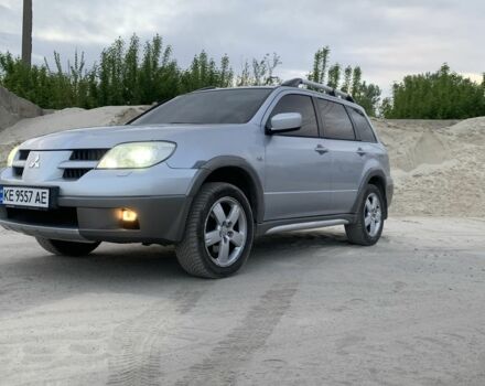 Серый Мицубиси Аутлендер, объемом двигателя 2.4 л и пробегом 229 тыс. км за 4850 $, фото 1 на Automoto.ua