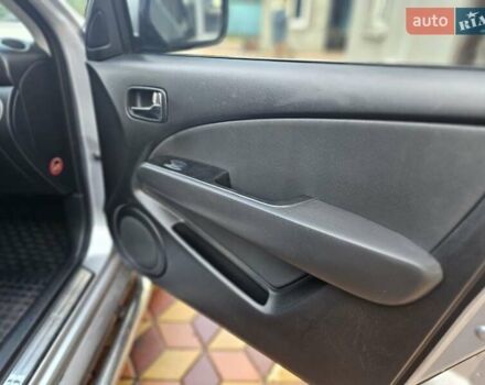 Сірий Міцубісі Аутлендер, об'ємом двигуна 2.4 л та пробігом 161 тис. км за 7500 $, фото 1 на Automoto.ua