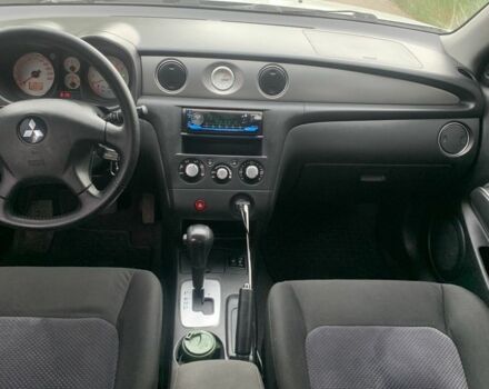 Серый Мицубиси Аутлендер, объемом двигателя 2.4 л и пробегом 229 тыс. км за 4850 $, фото 6 на Automoto.ua