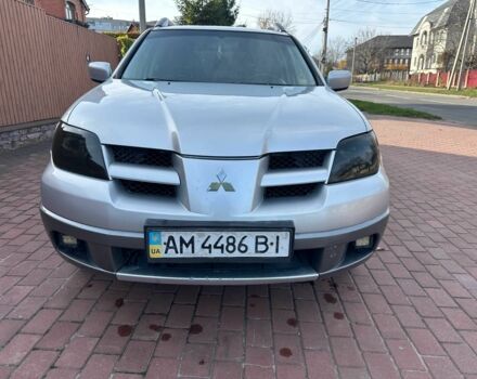 Серый Мицубиси Аутлендер, объемом двигателя 2.4 л и пробегом 221 тыс. км за 5550 $, фото 2 на Automoto.ua