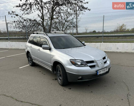 Сірий Міцубісі Аутлендер, об'ємом двигуна 2.38 л та пробігом 252 тис. км за 5400 $, фото 1 на Automoto.ua