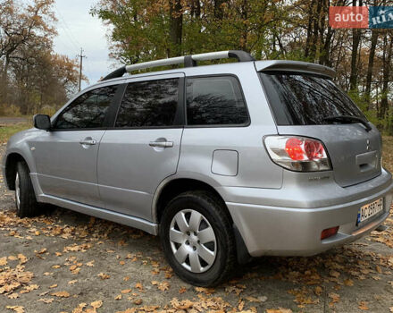 Серый Мицубиси Аутлендер, объемом двигателя 2 л и пробегом 239 тыс. км за 5800 $, фото 3 на Automoto.ua