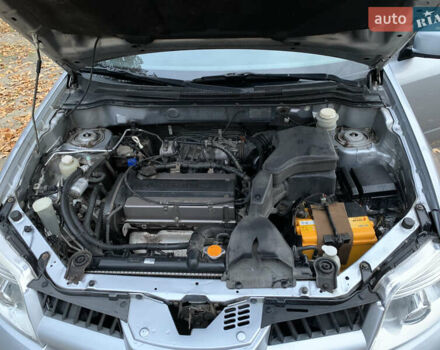 Серый Мицубиси Аутлендер, объемом двигателя 2 л и пробегом 239 тыс. км за 5800 $, фото 17 на Automoto.ua