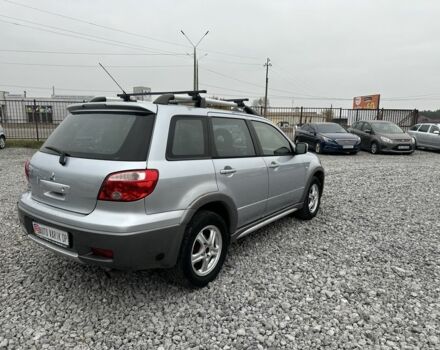 Серый Мицубиси Аутлендер, объемом двигателя 2.4 л и пробегом 260 тыс. км за 5750 $, фото 3 на Automoto.ua