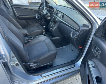 Серый Мицубиси Аутлендер, объемом двигателя 2 л и пробегом 220 тыс. км за 4550 $, фото 10 на Automoto.ua