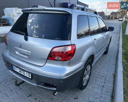 Серый Мицубиси Аутлендер, объемом двигателя 2 л и пробегом 220 тыс. км за 4550 $, фото 7 на Automoto.ua