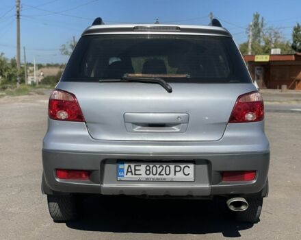 Серый Мицубиси Аутлендер, объемом двигателя 2 л и пробегом 225 тыс. км за 5999 $, фото 4 на Automoto.ua