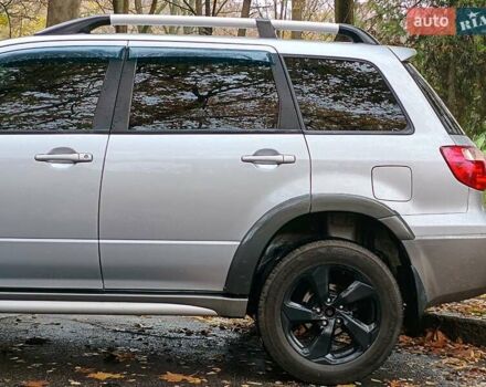 Серый Мицубиси Аутлендер, объемом двигателя 2.38 л и пробегом 266 тыс. км за 6399 $, фото 3 на Automoto.ua
