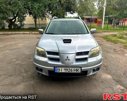 Сірий Міцубісі Аутлендер, об'ємом двигуна 2 л та пробігом 250 тис. км за 5800 $, фото 6 на Automoto.ua