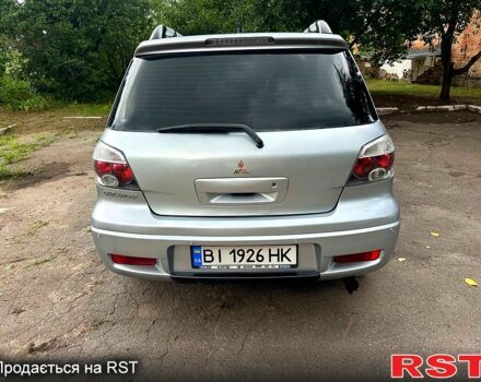 Сірий Міцубісі Аутлендер, об'ємом двигуна 2 л та пробігом 250 тис. км за 5800 $, фото 9 на Automoto.ua