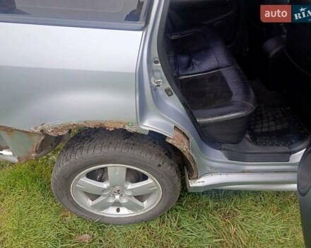 Сірий Міцубісі Аутлендер, об'ємом двигуна 2 л та пробігом 230 тис. км за 5200 $, фото 11 на Automoto.ua