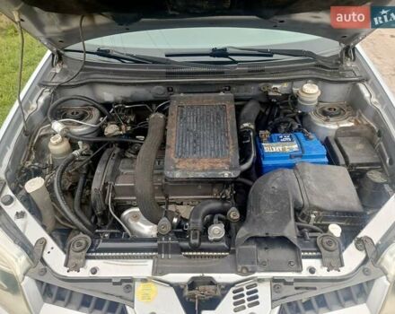 Сірий Міцубісі Аутлендер, об'ємом двигуна 2 л та пробігом 230 тис. км за 5200 $, фото 18 на Automoto.ua