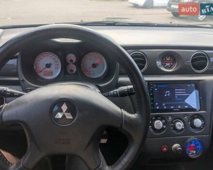 Сірий Міцубісі Аутлендер, об'ємом двигуна 2 л та пробігом 261 тис. км за 7200 $, фото 19 на Automoto.ua