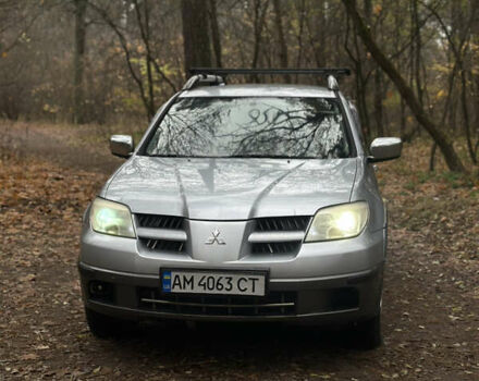 Сірий Міцубісі Аутлендер, об'ємом двигуна 2.38 л та пробігом 303 тис. км за 5200 $, фото 7 на Automoto.ua